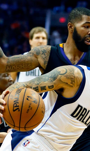 Mavs roll past Suns with 8 players in double figures